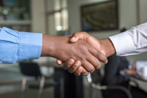 corporate move handshake