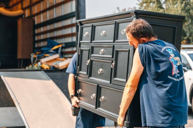 Larsen Transfer crew moving a cabinet